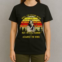 Well I’m Older Now But I’m Still Running Against The Wind T-Shirt