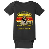 Well I’m Older Now But I’m Still Running Against The Wind Baby Bodysuit