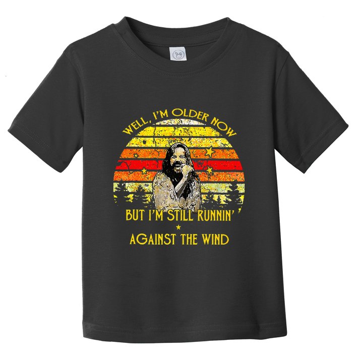 Well I’m Older Now But I’m Still Running Against The Wind Toddler T-Shirt