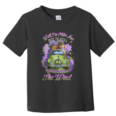 Well Im Older Now But Im Still Running Against The Wind Toddler T-Shirt