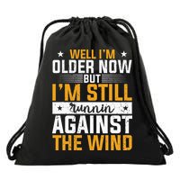 Well I’m Older Now But I’m Still Running Against The Wind Drawstring Bag