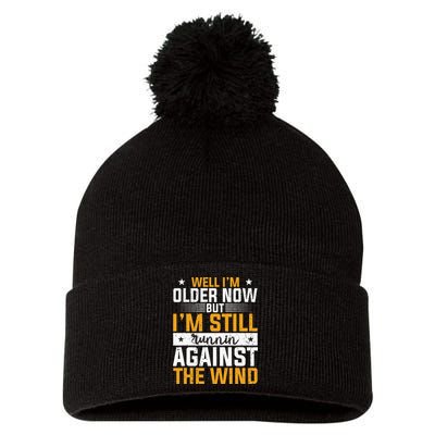Well I’m Older Now But I’m Still Running Against The Wind Pom Pom 12in Knit Beanie