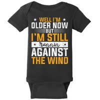Well I’m Older Now But I’m Still Running Against The Wind Baby Bodysuit