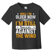 Well I’m Older Now But I’m Still Running Against The Wind Toddler T-Shirt