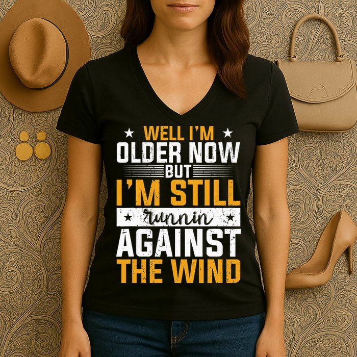 Well I’m Older Now But I’m Still Running Against The Wind Women's V-Neck T-Shirt