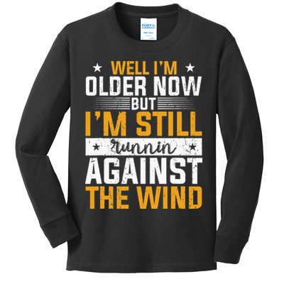 Well I’m Older Now But I’m Still Running Against The Wind Kids Long Sleeve Shirt