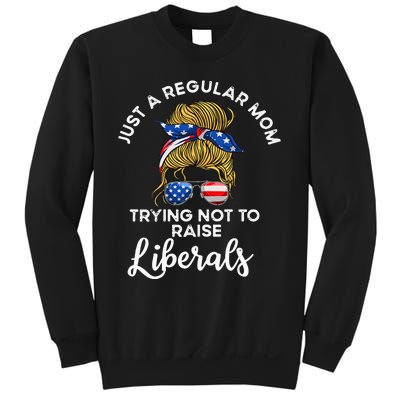 Wo Just a regular mom trying not to raise liberals Sweatshirt