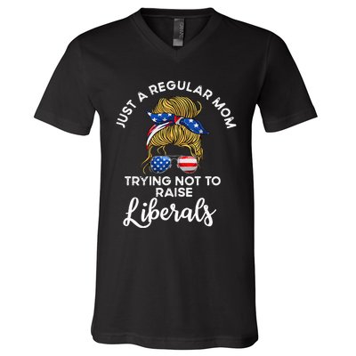 Wo Just a regular mom trying not to raise liberals V-Neck T-Shirt