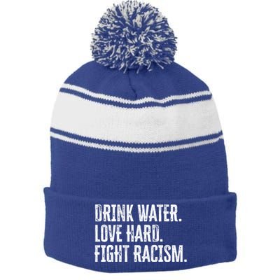 Water Love Hard Fight Racism Antigiftracism Great Gift Stripe Pom Pom Beanie