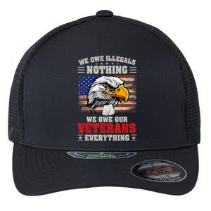 We Owe Illegals Nothing We Owe Our Veterans Everything Flexfit Unipanel Trucker Cap