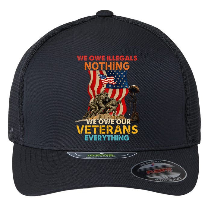 We Owe Illegals Nothing We Owe Our Veterans Everything Flexfit Unipanel Trucker Cap