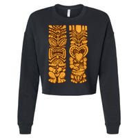 Wooden statues of Tiki with ukulele and drum Cropped Pullover Crew