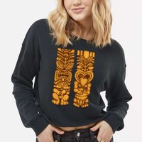 Wooden statues of Tiki with ukulele and drum Cropped Pullover Crew