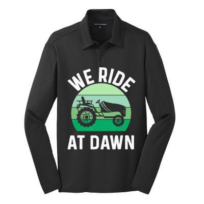 We Ride At Dawn Lawnmower Lawn Mowing Dad Yard Work Silk Touch Performance Long Sleeve Polo