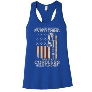 We're Redefining Everything This Is A Cordless Hole Puncher Gift Women's Racerback Tank