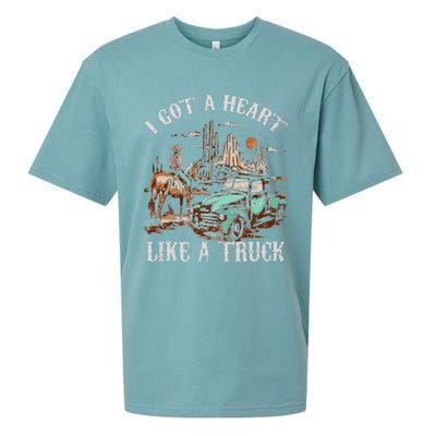 Western Sunset Cow I Got A Heart Like A Truck Vintage Sueded Cloud Jersey T-Shirt