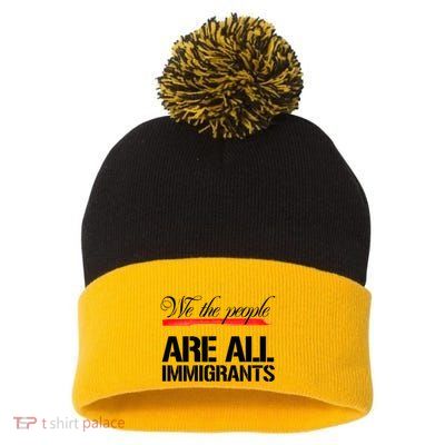 We The People Are All Immigrants Pom Pom 12in Knit Beanie