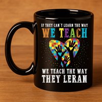 We Teach The Way They Lean Autism Awareness Month 11oz C Handle Ceramic Mug