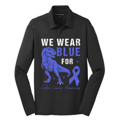 We Wear Blue For Colon Cancer Awareness Tgiftrex Dino Gift Silk Touch Performance Long Sleeve Polo