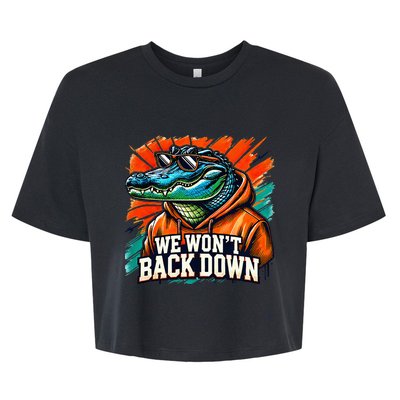 We WonT Back Down Blue And Orange Gator White Bella+Canvas Jersey Crop Tee