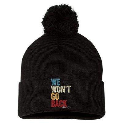 We WonT Go Back Kamala Harris 2024 Kamala Waltz Vintage Gift Pom Pom 12in Knit Beanie