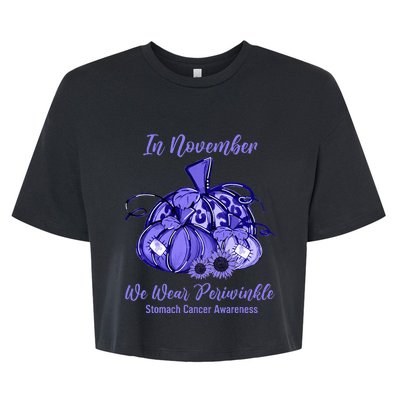 we wear periwinkle pumpkin stomach cancer awareness Bella+Canvas Jersey Crop Tee