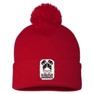 We Wear Red For Red Ribbon Week Awareness Messy Bun Bleached Pom Pom 12in Knit Beanie