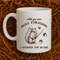 While You Were Busy Foraging I Studied The Blade Retro Mug