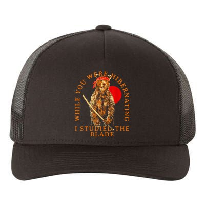 While You Were Hibernating I Studied The Blade Bear Samurai Yupoong Adult 5-Panel Trucker Hat