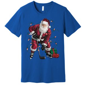 Xmas Lighting Santa Playing Hockey Christmas Gift Premium T-Shirt