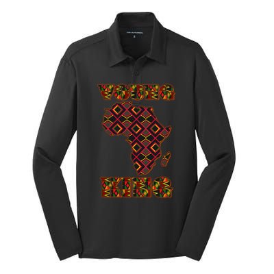 Young African King African Cloth Pattern Celebrating Black History Silk Touch Performance Long Sleeve Polo