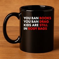 You Ban Books You Ban Drag Are Still In Body Bags 11oz C Handle Ceramic Mug