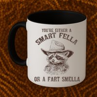 YouRe Either A Smart Fella Or A Fart Smella Funny Raccoon Mug