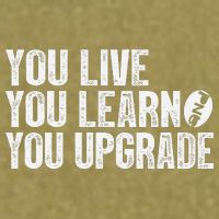 You Live You Learn You Upgrade Funny Design Garment-Dyed Women's Muscle Tee